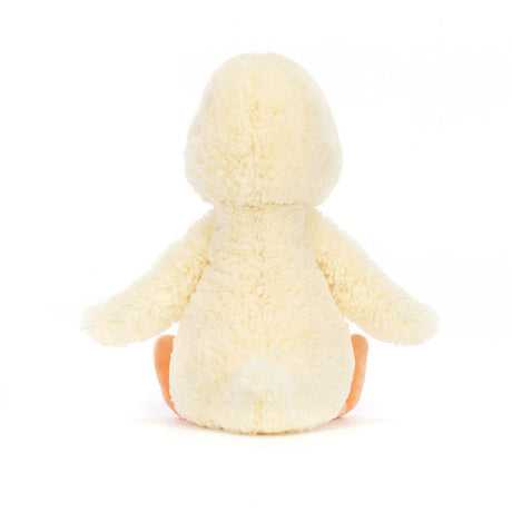 Soft plush Bashful Duckling toy showing its back with pale yellow colored fur and orange feet, perfect as a cuddly stuffed animal for toddlers.