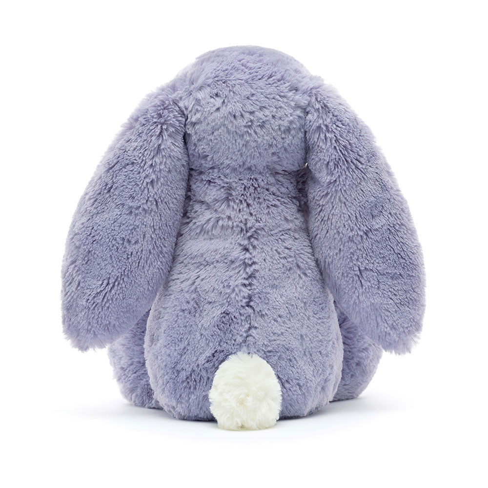 Bashful Viola Bunny Medium plush toy shown from the back, featuring soft purple fur, long floppy ears, and a small white fluffy tail, perfect as a cuddly stuffed animal gift.