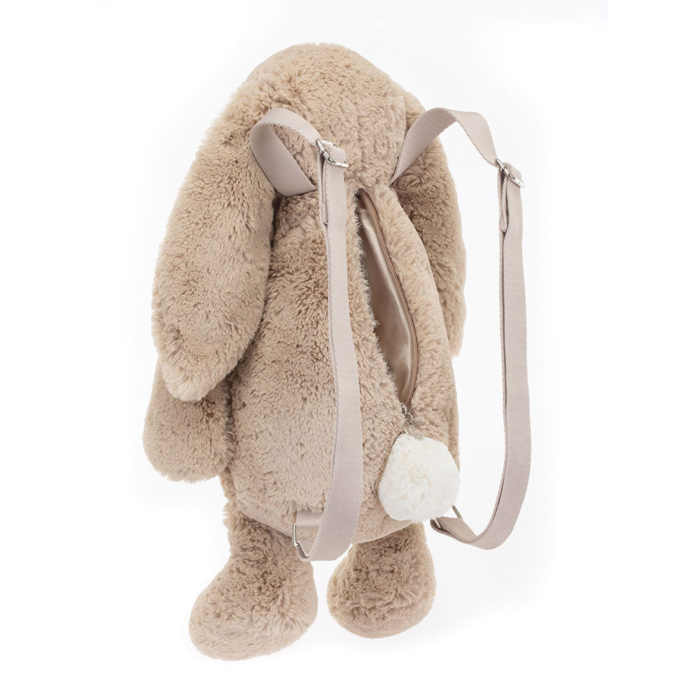 Bashful Beige Bunny Backpack featuring soft plush fur, floppy ears, adjustable beige straps, and a fluffy tail zipper pull, perfect for kids as a playful stuffed animal backpack.