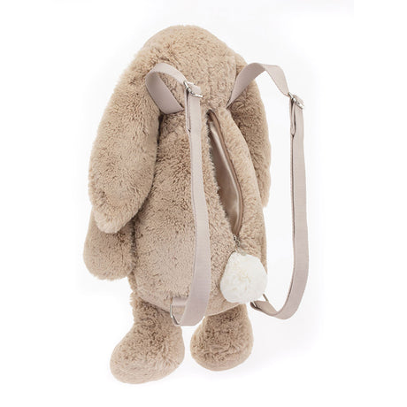 Bashful Beige Bunny Backpack featuring soft plush fur, floppy ears, adjustable beige straps, and a fluffy tail zipper pull, perfect for kids as a playful stuffed animal backpack.