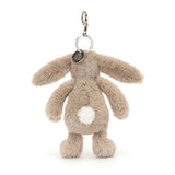 Bashful Beige Bunny Bag Charm plush keychain with soft beige fur, long floppy ears, and a small white heart-shaped tail, designed for adding a cute touch to bags.