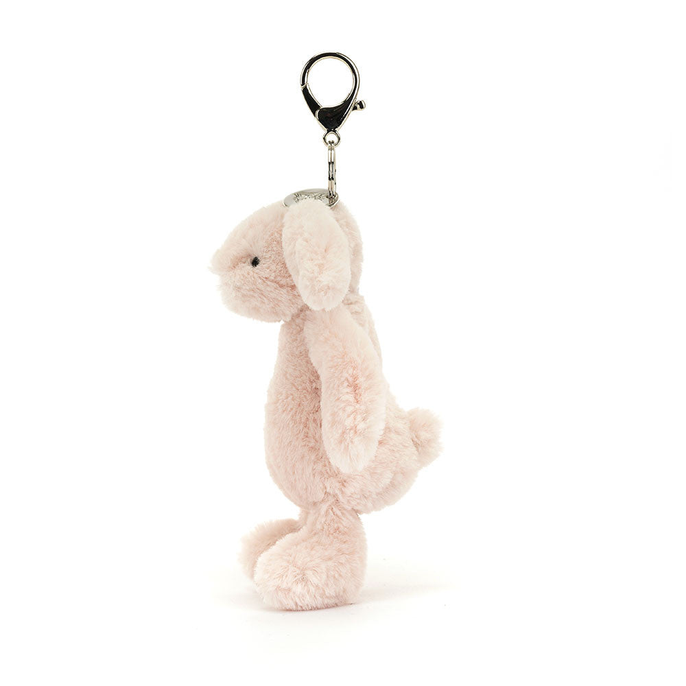 Soft blush pink plush bunny keychain with a silver clasp, designed as the Bashful Blush Bunny Bag Charm for adding a cute touch to bags or keys.