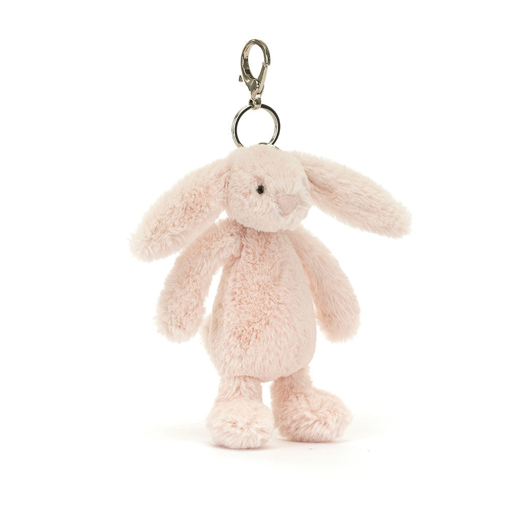 Bashful Blush Bunny Bag Charm hanging keychain featuring a soft pastel pink plush bunny with long ears, perfect for adding a cute touch to bags or backpacks.