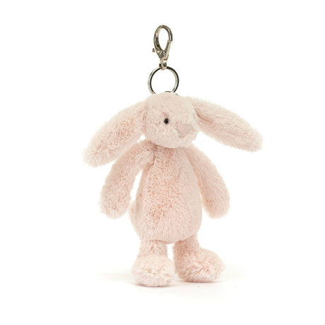 Bashful Blush Bunny Bag Charm hanging keychain featuring a soft pastel pink plush bunny with long ears, perfect for adding a cute touch to bags or backpacks.