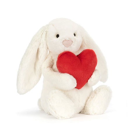 Bashful Red Love Heart Bunny plush toy holding a soft red heart, featuring long ears and a gentle expression, perfect as a kid's birthday gift or toddler toy.