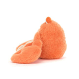 Soft and fluffy orange Pinchsnap Crab plush toy with a round body and large claws, perfect for cuddling and imaginative play.