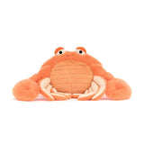 Soft orange plush toy crab with large eyes and detailed legs, designed as a friendly toy called Pinchsnap Crab.