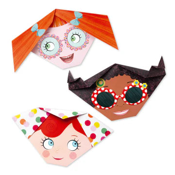 Three paper masks with colorful designs on a white background