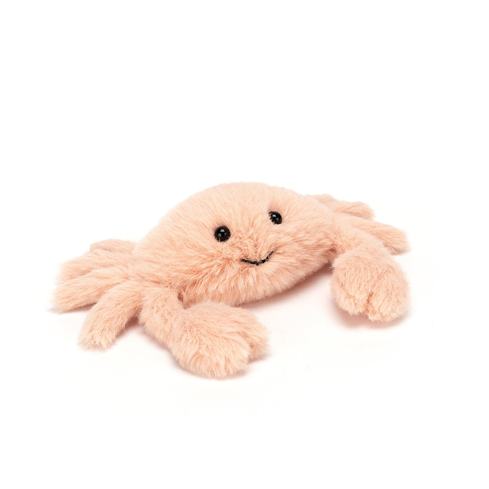 Plush crab toy on a white background