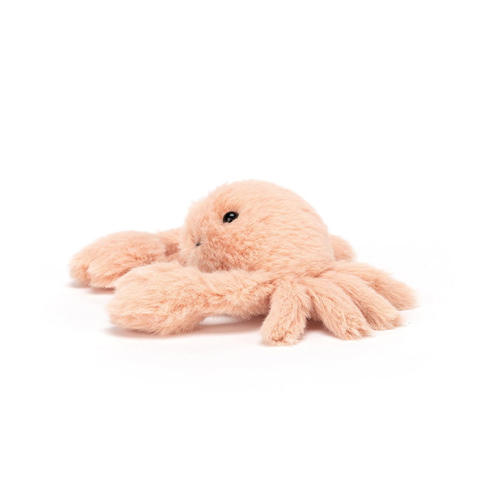 Plush toy crab on a white background