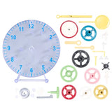 A children's DIY Clock kit laid out on a white background, including a translucent clock face, colorful gears, small metal parts, and yellow tools.