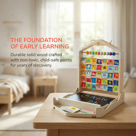 Children's educational Alphabet Learning Pack with letters and numbers on a wooden table in a room.
