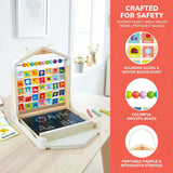 Children's educational Alphabet Learning Pack with colorful letters and numbers on a wooden stand, placed on a table.