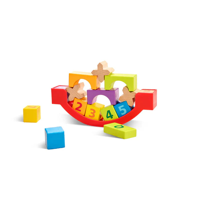 Colorful wooden Grow With Me Blocks with numbers and shapes on a white background