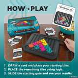 Marble circuit game with instructions and components on a table