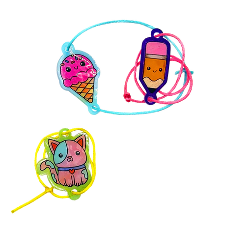 Three colorful Shrink-its! DIY Shrink Art Bracelet Kit - BFF  with cartoon character ends on a white background