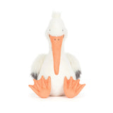 Soft plush Keli Pelican toy with a long orange beak, fluffy white body, gray wing tips, and large orange webbed feet, perfect for kids' imaginative play.