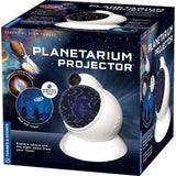 Boxed planetarium projector with images of space and stars on a dark blue background