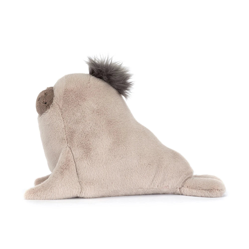 Soft and cuddly Roarwell Sea Lion plush toy in neutral tones, featuring a tuft of dark fur on its head, perfect for a child's stuffed animal collection.