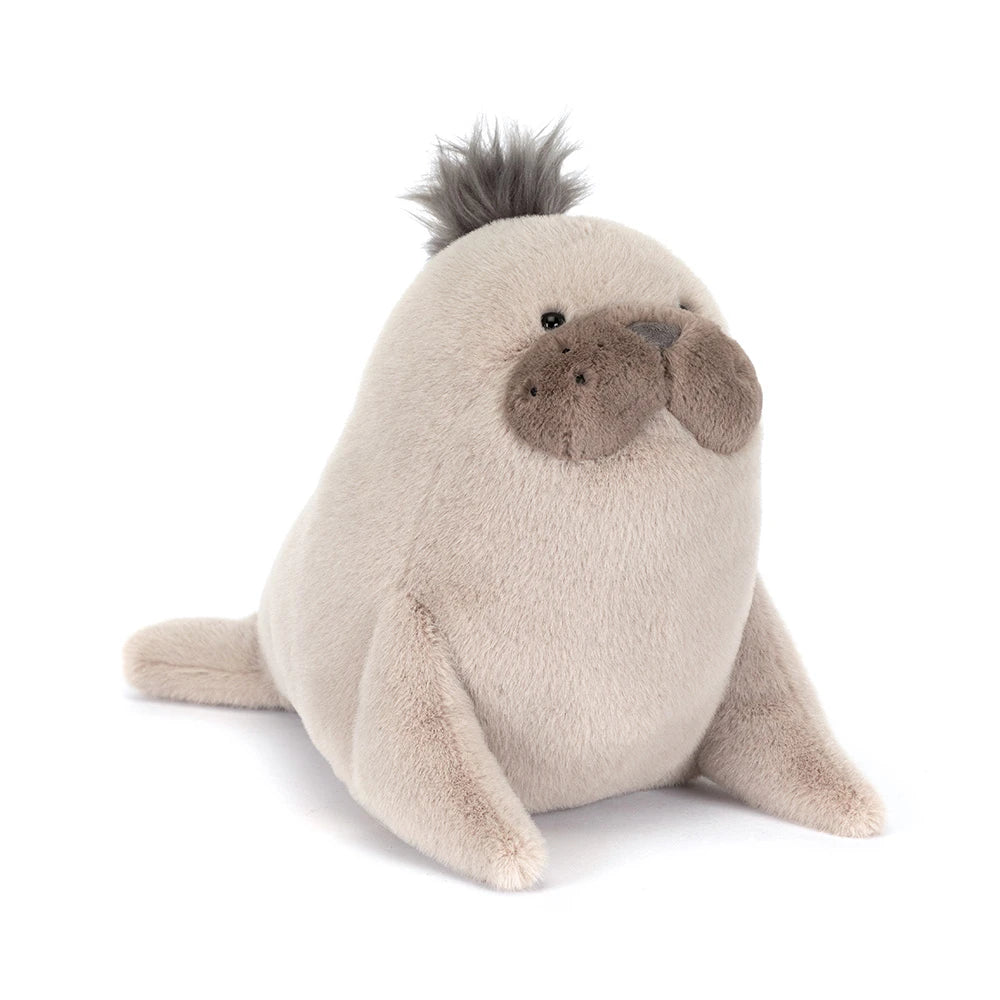 Soft and cuddly plush Roarwell Sea Lion toy with a friendly face and tuft of dark fur, perfect for kids and a charming addition to any toy collection.