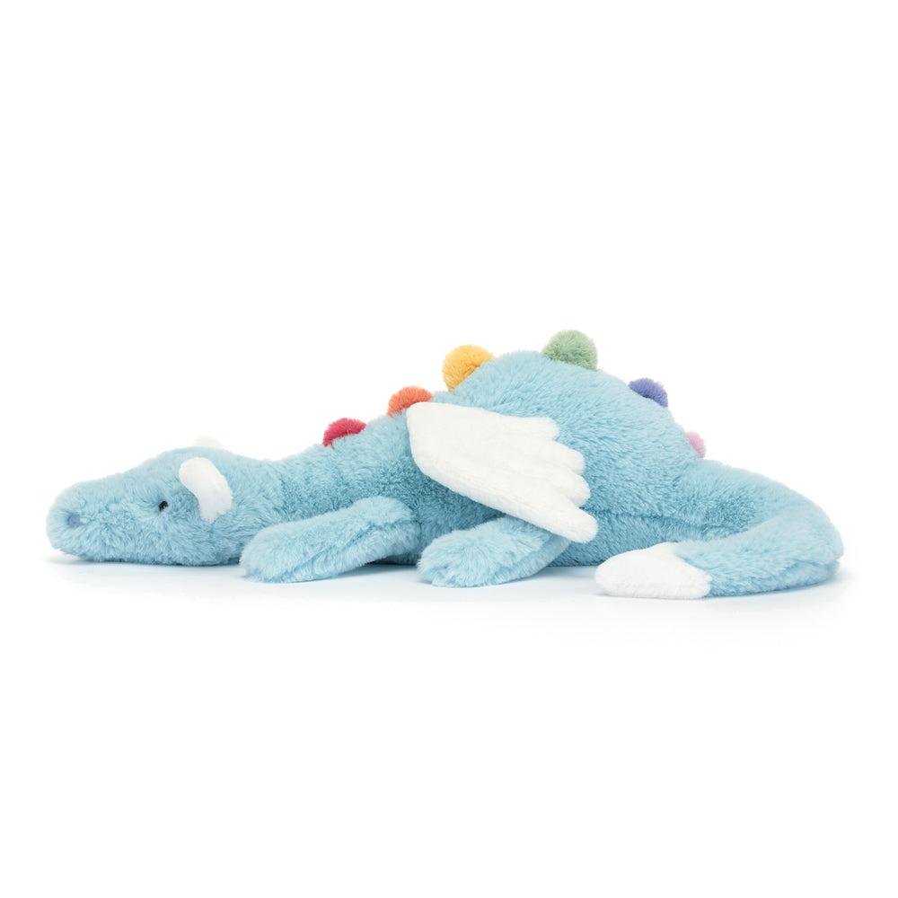 Sky Dragon Large is a soft blue plush dragon toy with white wings and colorful rounded spikes along its back, designed for children’s play and comfort.