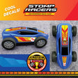 Two toy race cars with 'Stomp Racers' branding and promotional text on a gray background.