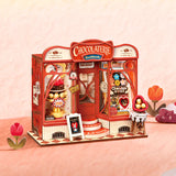 Sweet Chocolate Shop, Super Mini Houses with chocolate-themed products on a pink background