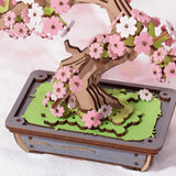 Sakura Bonsai DIY Wooden 3D Puzzle model with pink flowers on a white background