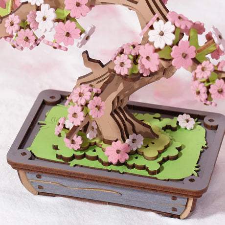 Sakura Bonsai DIY Wooden 3D Puzzle model with pink flowers on a white background
