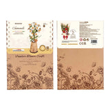 Rowood Chamomile DIY Wooden Flower 3D Puzzle packaging with floral designs on a white background
