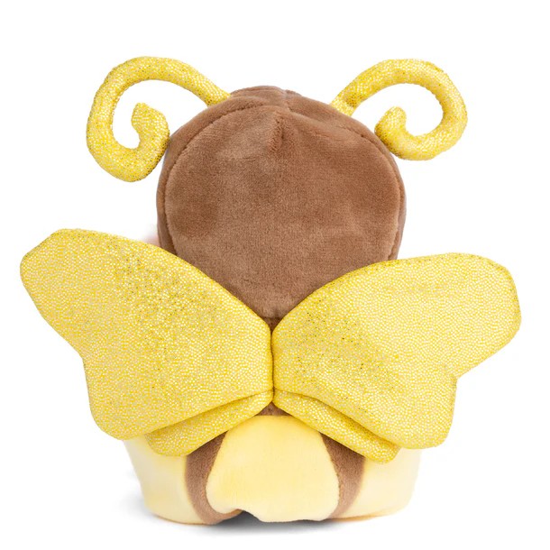 Plush toy bear in a yellow butterfly costume on a white background