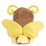 Plush toy bear in a yellow butterfly costume on a white background