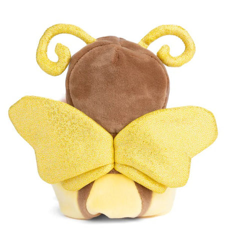 Plush toy bear in a yellow butterfly costume on a white background