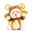 Plush toy bear in a yellow butterfly costume on a white background