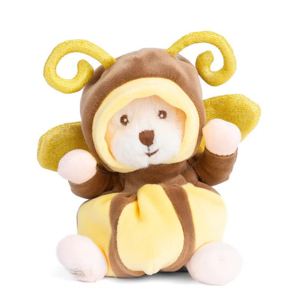 Plush toy bear in a yellow butterfly costume on a white background