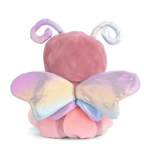 Plush toy bear in a pink butterfly costume with horns on a white background