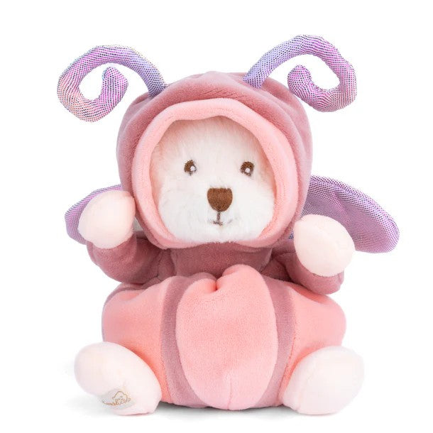 Plush toy bear in a pink butterfly costume with horns on a white background
