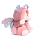 Plush toy bear in a pink butterfly costume with horns on a white background
