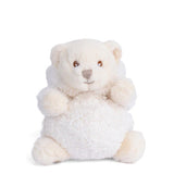 Plush toy bear dressed as a rabbit in a white outfit on a white background