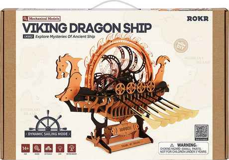 Box of a Viking Dragon Ship model kit by ROKR with wooden ship illustration on beige background