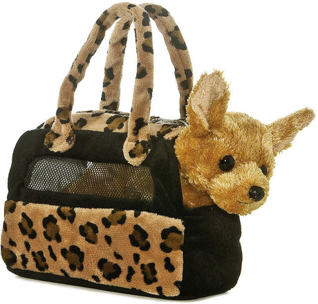 Pet carrier with leopard print design and a plush toy dog inside on a white background