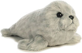 Plush toy seal on a white background
