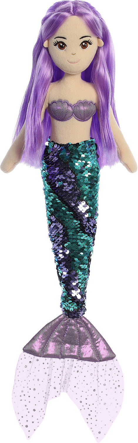 Mermaid doll with purple hair and sequin tail on a white background