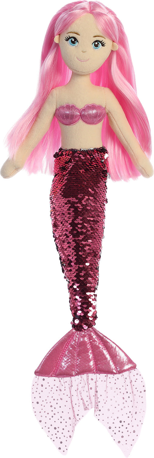 Mermaid doll with pink hair and sequin tail on a white background