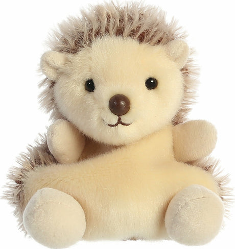 Plush toy hedgehog with a cream body and brown spines on a white background