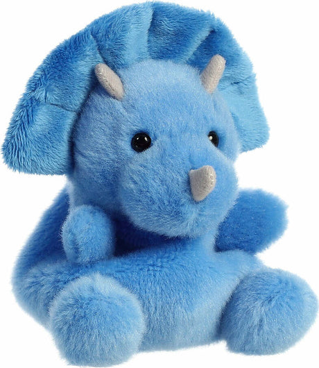 Blue plush dinosaur with a triceratops design on a white background