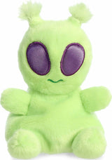 Green plush alien with purple eyes on a white background