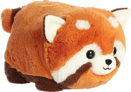 Plush toy of a red panda on a white background