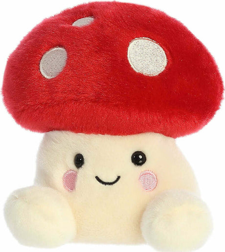 Plush toy red mushroom and smiling face on a white background