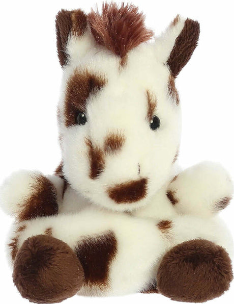 Plush toy horse with brown spots on a white background